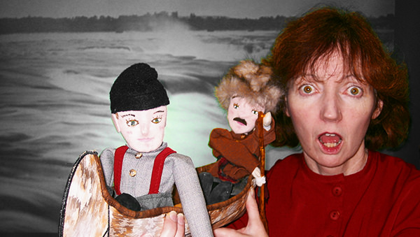 Kathy and puppets in canoe