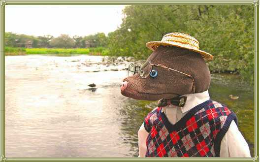 Mole looks out at the river...